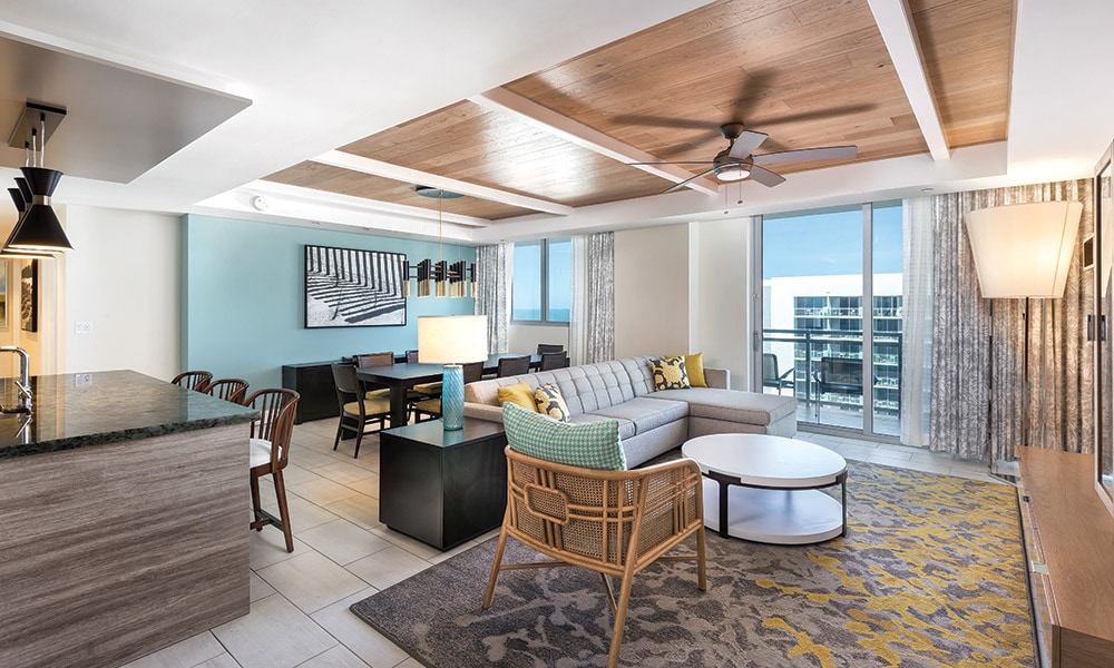 Living room and dining of the presidential suite at CW Clearwater